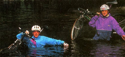 cyclists crossing water